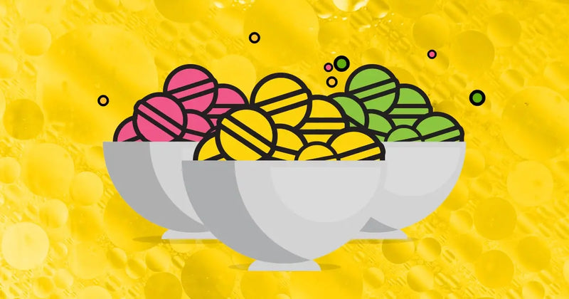 Colorful display of round bath bombs arranged in rows at a retail bath bomb bar, with signage offering bundle deals like ‘Buy 4 for $20'