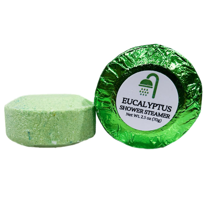 Extra-large 2.5 oz Eucalyptus shower steamer, individually wrapped in colored foil, releasing a refreshing and invigorating eucalyptus scent for a revitalizing shower experience.