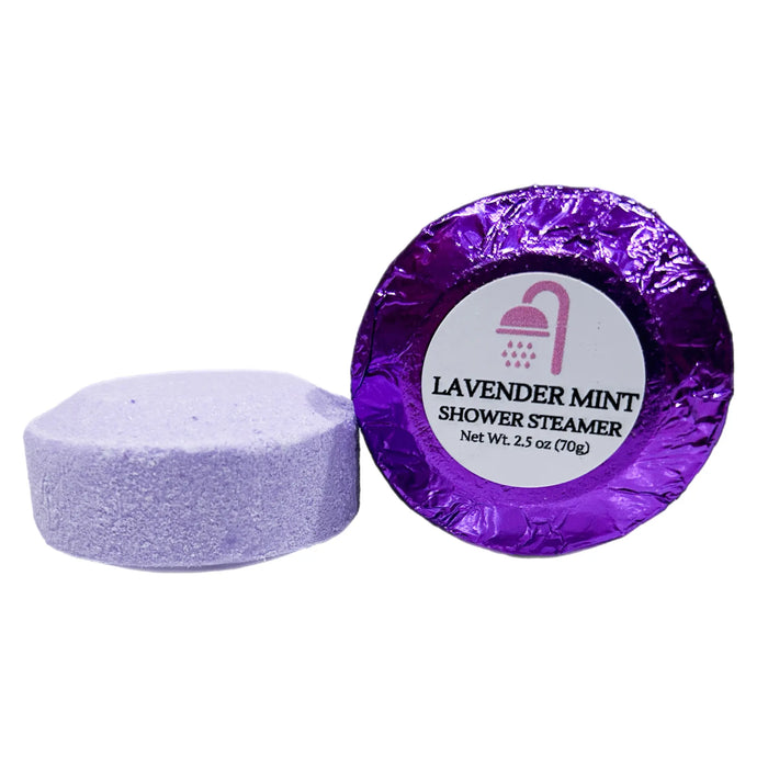 Extra-large 2.5 oz Lavender Mint shower steamer, individually wrapped in colored foil, combining soothing lavender with refreshing mint for a calming and invigorating shower experience.