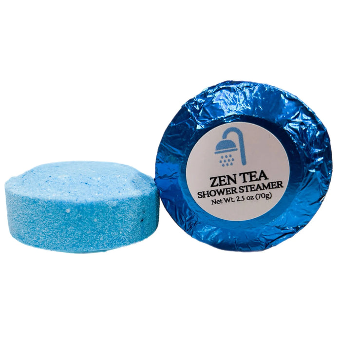 Extra-large 2.5 oz Zen Tea shower steamer, individually wrapped in colored foil, featuring a calming blend of soothing tea and light floral notes for a relaxing and rejuvenating shower experience.